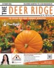 Cover of October newsletter featuring an large bright pumpkin.